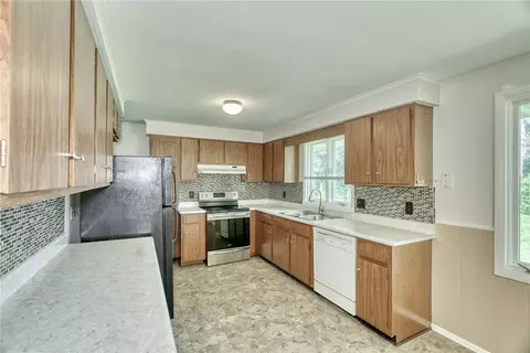 Kitchen - 82 Woolacott Rd, Irondequoit, NY 14617 photo 4 of 6