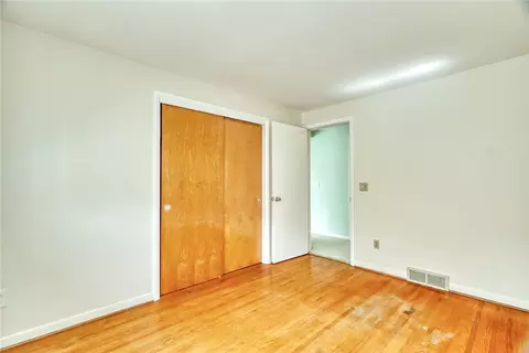 Bedroom - 82 Woolacott Rd, Irondequoit, NY 14617 photo 3 of 9