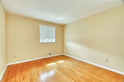 Bedroom - 82 Woolacott Rd, Irondequoit, NY 14617 photo 5 of 9