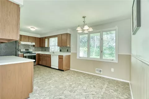 Kitchen - 82 Woolacott Rd, Irondequoit, NY 14617 photo 2 of 6