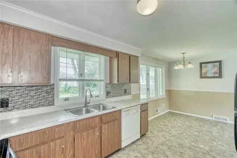 Kitchen - 82 Woolacott Rd, Irondequoit, NY 14617 photo 5 of 6