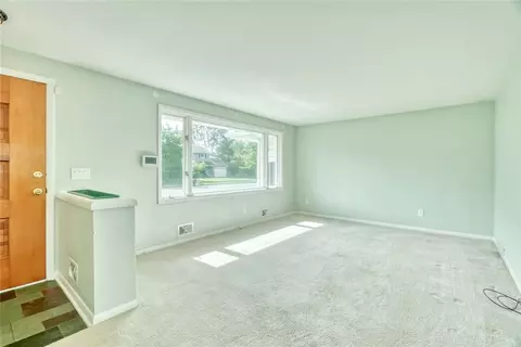 Living - 82 Woolacott Rd, Irondequoit, NY 14617 photo 1 of 4