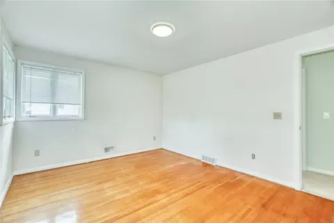 Bedroom - 82 Woolacott Rd, Irondequoit, NY 14617 photo 8 of 9