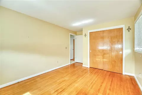 Bedroom - 82 Woolacott Rd, Irondequoit, NY 14617 photo 6 of 9