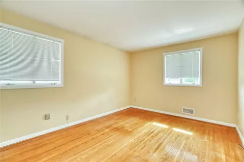 Bedroom - 82 Woolacott Rd, Irondequoit, NY 14617 photo 4 of 9