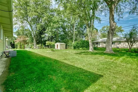 Exterior - 82 Woolacott Rd, Irondequoit, NY 14617 photo 6 of 8
