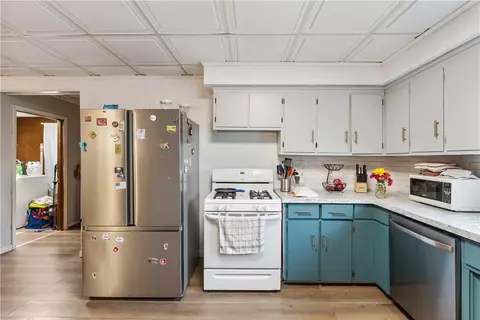 Kitchen - 147 Clark Ave, Irondequoit, NY 14609 photo 2 of 3