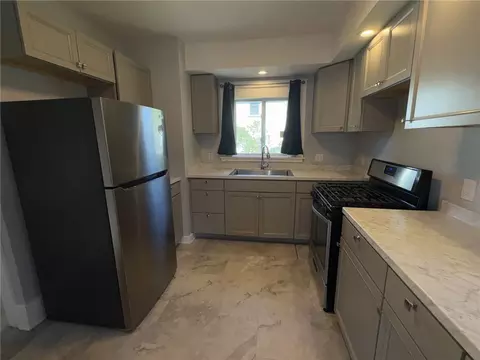 Kitchen - 32 Walzer Rd, Irondequoit, NY 14622 photo 2 of 2