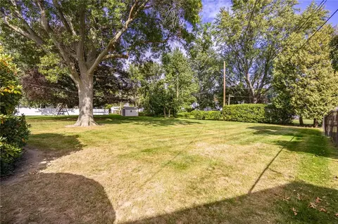 Exterior - 106 Pine Tree Ln, Irondequoit, NY 14617 photo 6 of 11