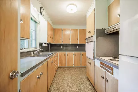 Kitchen - 106 Pine Tree Ln, Irondequoit, NY 14617 photo 1 of 7