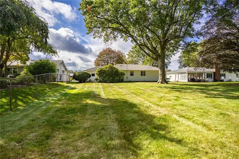 Exterior - 106 Pine Tree Ln, Irondequoit, NY 14617 photo 9 of 11