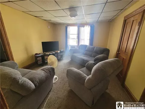 Living - 107 E 8th St, Jamestown, NY 14701 photo 1 of 2