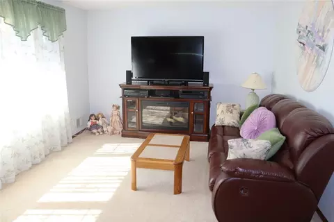 Living - 10 Cold Spring Cir, Gates, NY 14624 photo 1 of 2