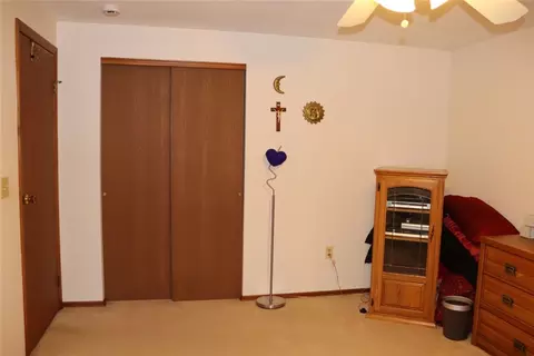 Bedroom - 10 Cold Spring Cir, Gates, NY 14624 photo 2 of 3