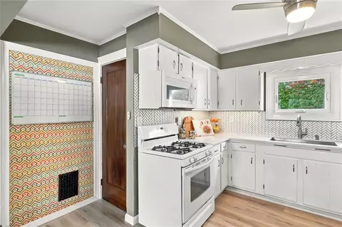 Kitchen - 240 Hurstbourne Rd, Irondequoit, NY 14609 photo 2 of 4