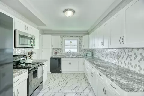 Kitchen - 408 Spencer Rd, Irondequoit, NY 14609 photo 3 of 4