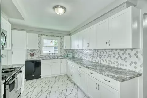 Kitchen - 408 Spencer Rd, Irondequoit, NY 14609 photo 2 of 4