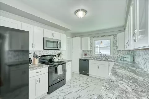 Kitchen - 408 Spencer Rd, Irondequoit, NY 14609 photo 1 of 4