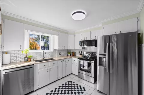 Kitchen - 551 Spencer Rd, Irondequoit, NY 14609 photo 1 of 3