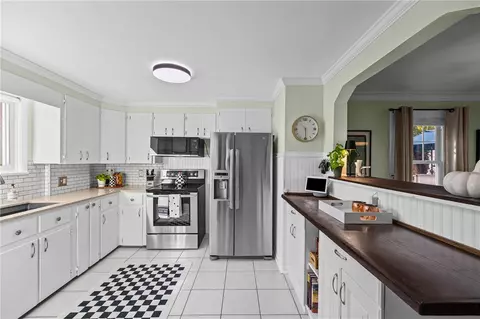 Kitchen - 551 Spencer Rd, Irondequoit, NY 14609 photo 2 of 3