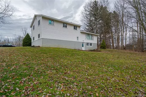 Exterior - 7819 River Rd, Lysander, NY 13027 photo 5 of 7