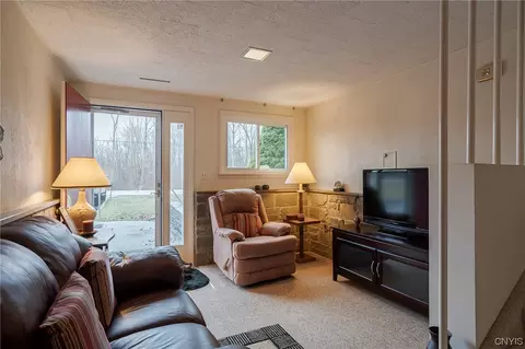 Living - 7819 River Rd, Lysander, NY 13027 photo 2 of 9