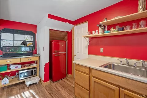 Kitchen - 504 Main St, Schroeppel, NY 13135 photo 7 of 7