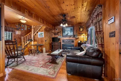 Living - 126 Ramblers Lodge Rd, Webb, NY 13420 photo 1 of 5