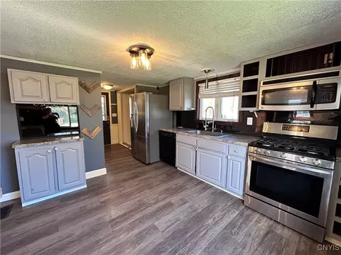 Kitchen - 81 E Oneida St, Lysander, NY 13027 photo 2 of 3