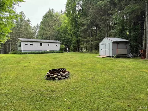 Exterior - 30 Treehaven Rd, Wethersfield, NY 14066 photo 4 of 22