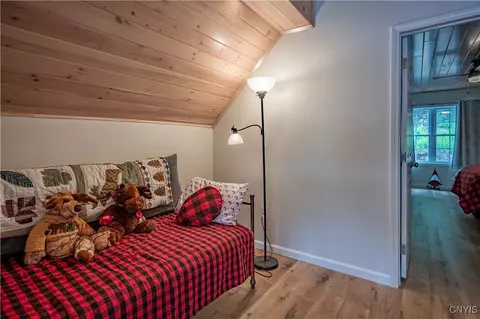 Bedroom - 142 S Shore Rd, Webb, NY 13420 photo 4 of 6