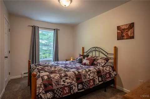 Bedroom - 142 S Shore Rd, Webb, NY 13420 photo 1 of 6