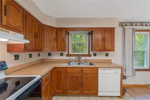 Kitchen - 160 Dutch Rd, Central Square, NY 13036 photo 6 of 8