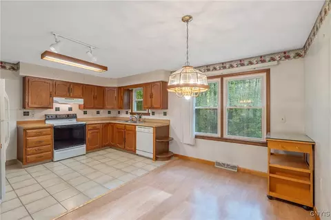 Kitchen - 160 Dutch Rd, Central Square, NY 13036 photo 1 of 8