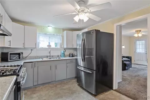 Kitchen - 42 Davis St, Schroeppel, NY 13135 photo 2 of 4