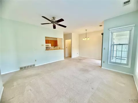 Living - 2402 Pipers Ct, Lysander, NY 13027 photo 2 of 2