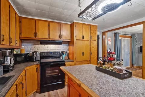 Kitchen - 67 Cherry St, Schroeppel, NY 13135 photo 3 of 3