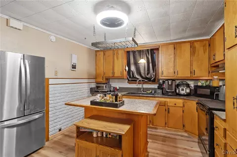 Kitchen - 67 Cherry St, Schroeppel, NY 13135 photo 2 of 3