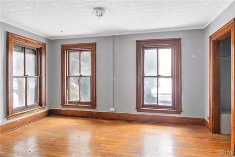 Bedroom - 76 E Genesee St, Auburn, NY 13021 photo 4 of 7
