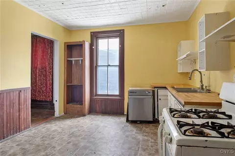 Kitchen - 76 E Genesee St, Auburn, NY 13021 photo 1 of 2