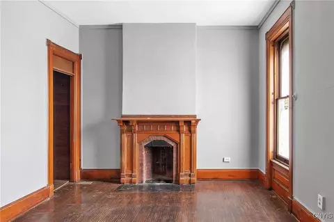 Living - 76 E Genesee St, Auburn, NY 13021 photo 1 of 7