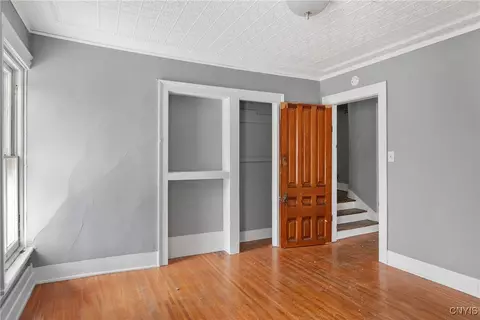 Bedroom - 76 E Genesee St, Auburn, NY 13021 photo 3 of 7