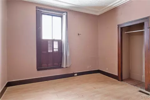 Bedroom - 76 E Genesee St, Auburn, NY 13021 photo 7 of 7