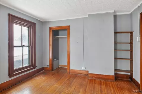 Bedroom - 76 E Genesee St, Auburn, NY 13021 photo 5 of 7