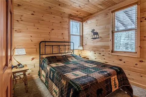 Bedroom - 156 S Shore Rd, Webb, NY 13420 photo 1 of 4