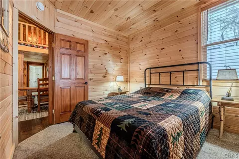 Bedroom - 156 S Shore Rd, Webb, NY 13420 photo 2 of 4