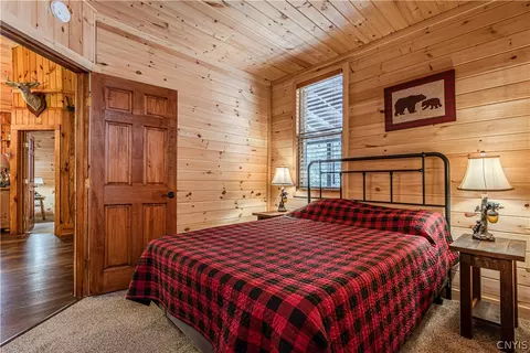 Bedroom - 156 S Shore Rd, Webb, NY 13420 photo 3 of 4