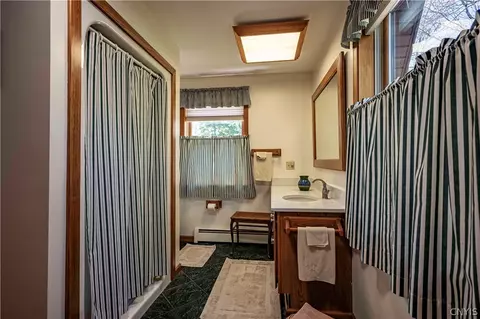 Bath - 128 Cedar Point Dr, Webb, NY 13420 photo 3 of 4
