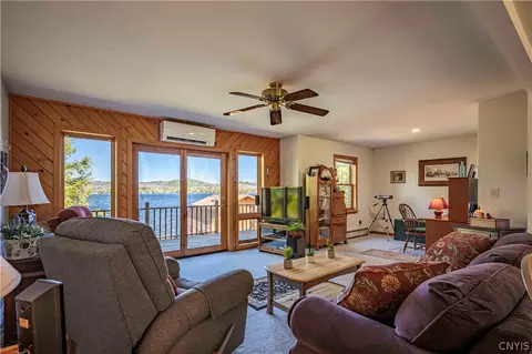 Living - 128 Cedar Point Dr, Webb, NY 13420 photo 1 of 4