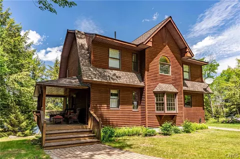 Exterior - 128 Cedar Point Dr, Webb, NY 13420 photo 5 of 13